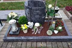 Beckum, Urnengrabstein mit Ornament Rose