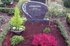 Steinhagen Waldfriedhof Grabstein mit Blume
